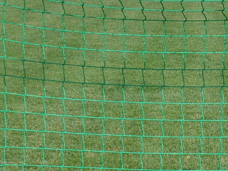 Ball stop net for sports facilities