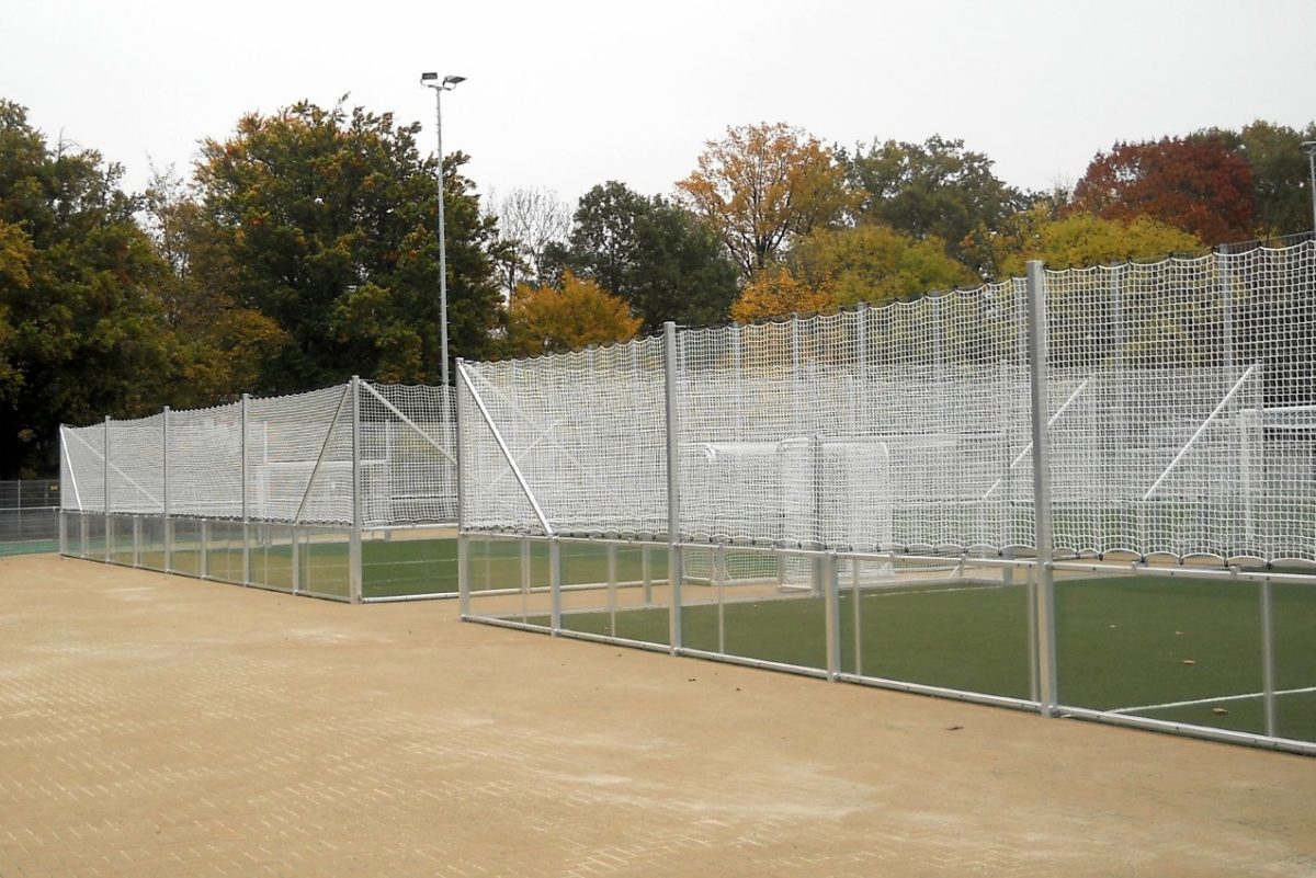 Stationary soccer court with glazed wall elements from artec